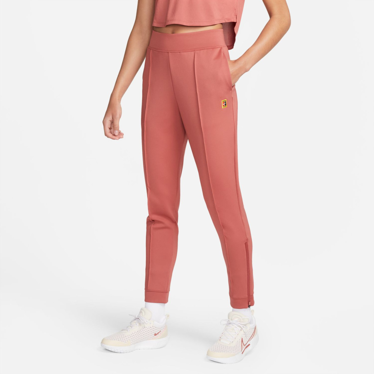 Pantalon Nike Court femme Dri-Fit Saumon